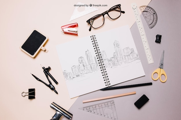 Free PSD back to school mockup with spiral notebook and glasses