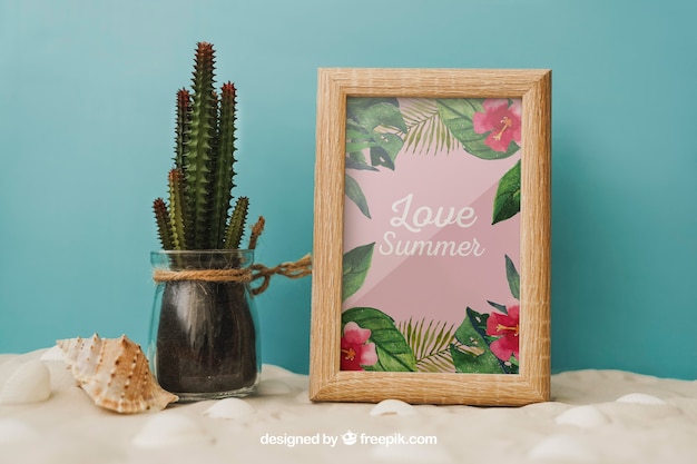 Beach concept with cactus and frame