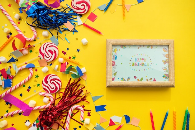 Free PSD birthday concept with frame and candy