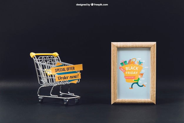 Free PSD black friday mockup with cart and frame