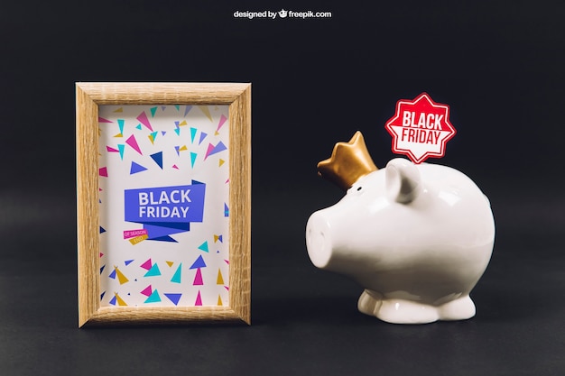 Free PSD black friday mockup with frame and piggybank