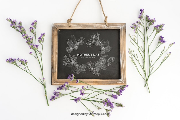 Free PSD blackboard mockup design with flowers