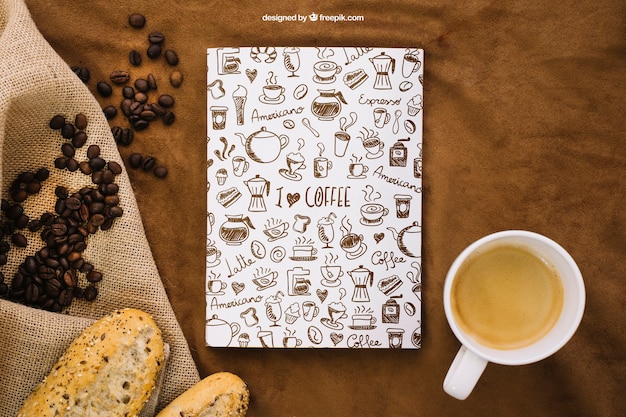 Free PSD book cover mockup with coffee