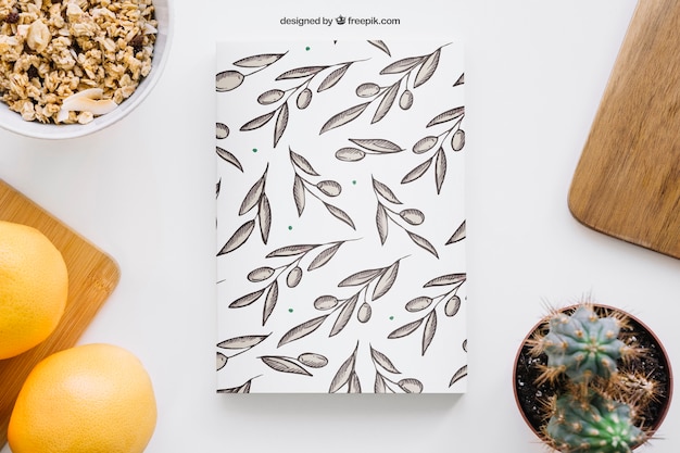 Book cover mockup with grapefruits and cactus