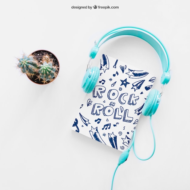 Free PSD book cover template with cactus and headphones