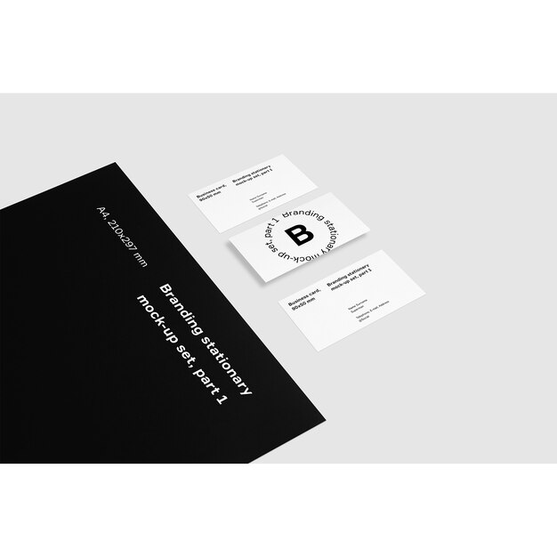 Business cards next to black folder mock up