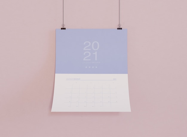 Free PSD calendar mockup on wall