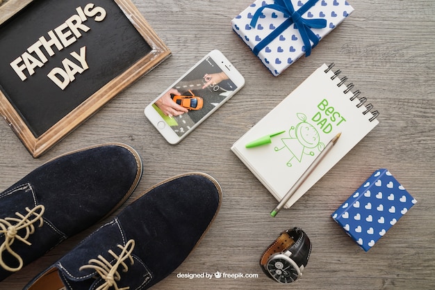 Free PSD father's day composition with notepad and shoes