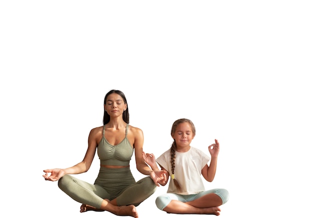 Free PSD female yoga instructor doing meditation with young girl