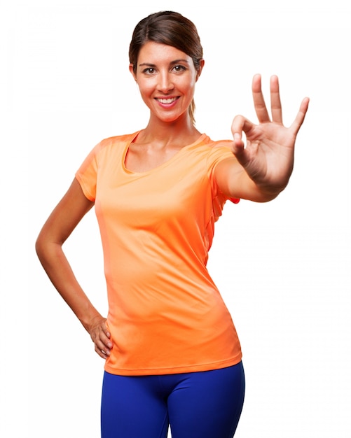 Free PSD girl in sportswear showing positive gesture