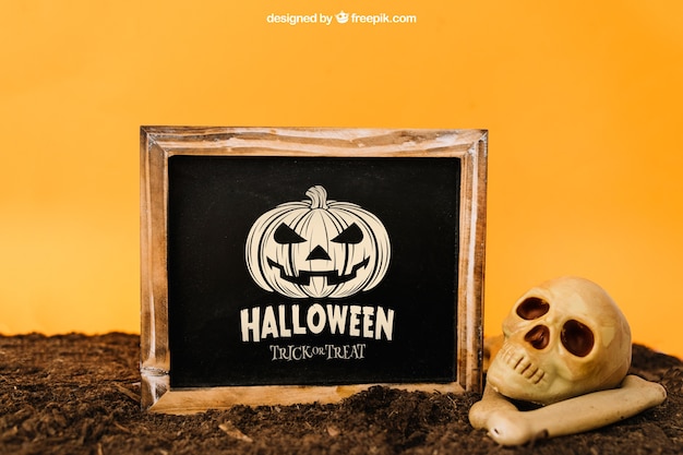 Free PSD halloween mockup with slate and skull