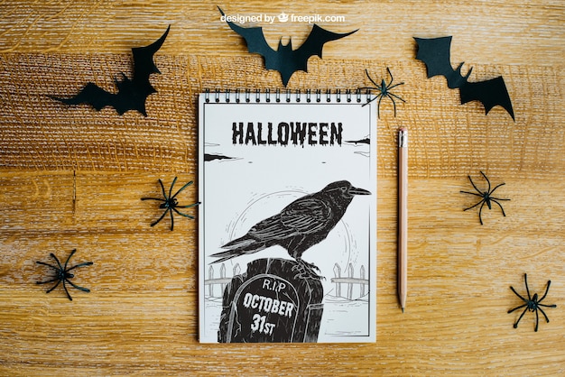 Free PSD halloween mockup with spiral notepad