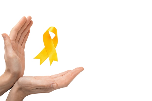 Free PSD hand with yellow ribbon