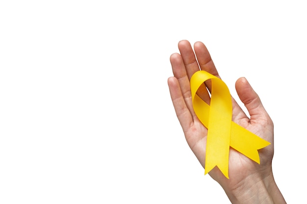 Free PSD hand with yellow ribbon