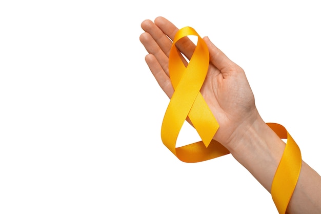 Free PSD hand with yellow ribbon