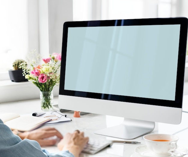 Free PSD hands typing with a mockup computer screen