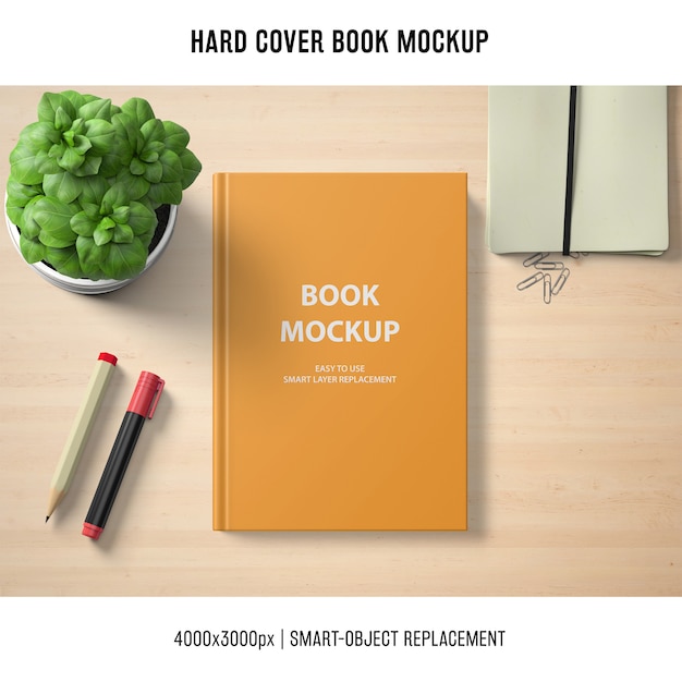 Free PSD hard cover book mockup with basil