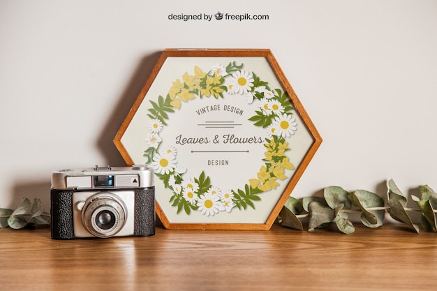 Free PSD hexagonal frame mockup with camera