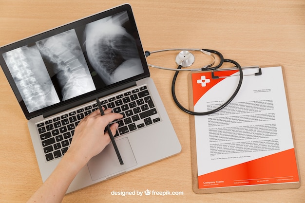 Free PSD laptop and document medical mock up