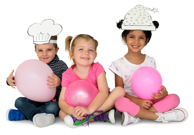 Free PSD little kids with papercrafted hats balloon