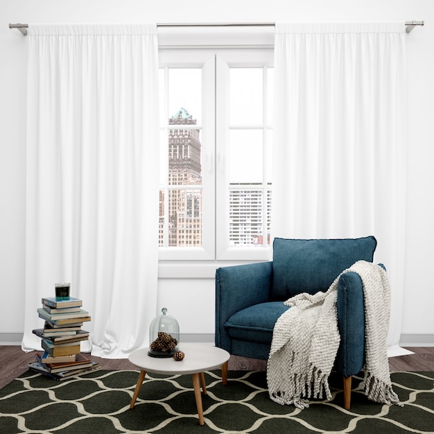 Free PSD living room with elegant armchair and large window, books stacked on the floor