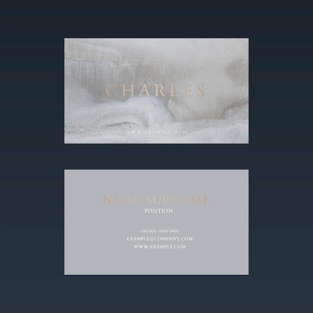 Luxury business card template psd in gold and gray tone with front and rear view flat lay