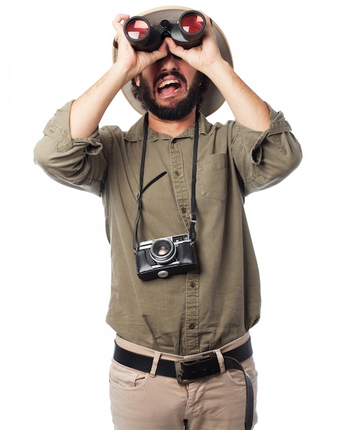 Man looking through binoculars