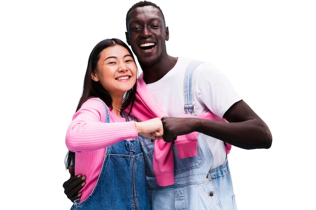 Medium shot young friends posing in studio