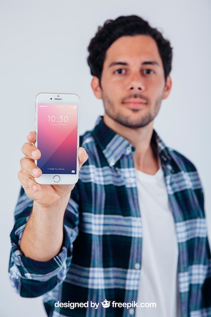 Mock up design of young guy with smartphone