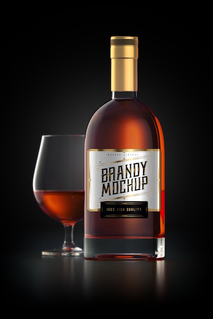 Free PSD mockup of a brandy glass bottle with label