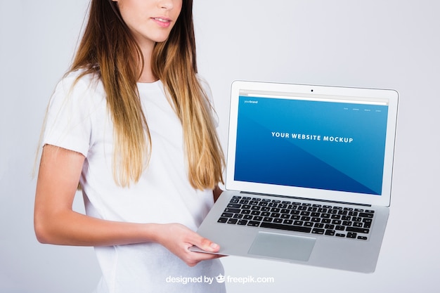 Mockup concept of woman with laptop