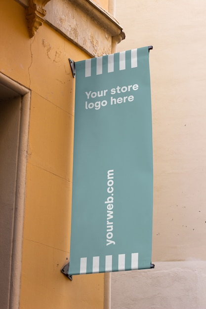 Free PSD mockup sign outside shop 