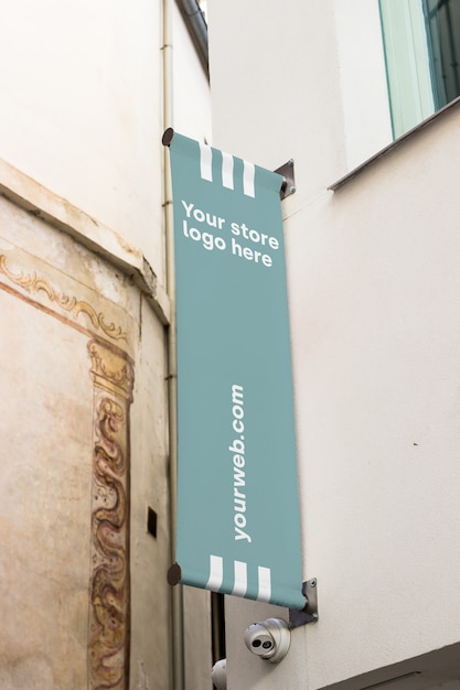 Free PSD mockup sign outside shop 