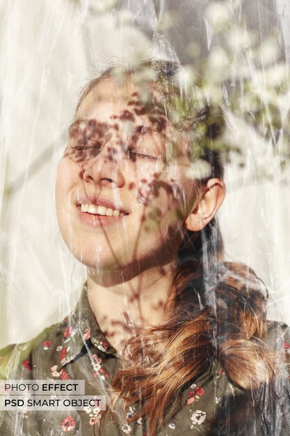 Plastic wrap effect over portrait of woman