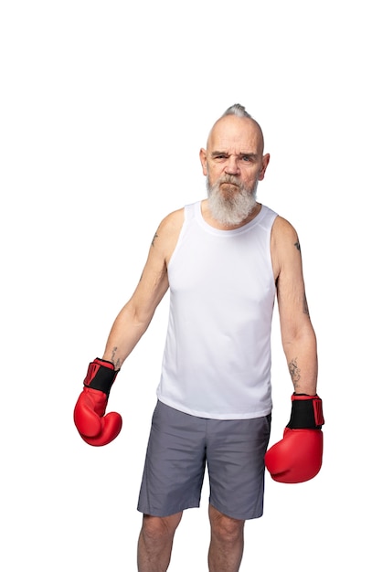 Portrait of senior man with boxing gloves