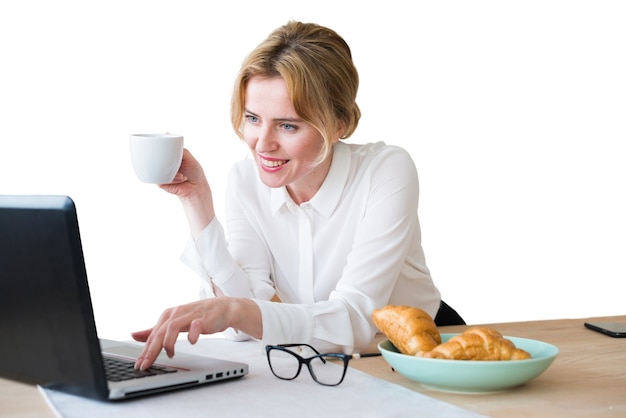 Free PSD portrait of woman using laptop computer