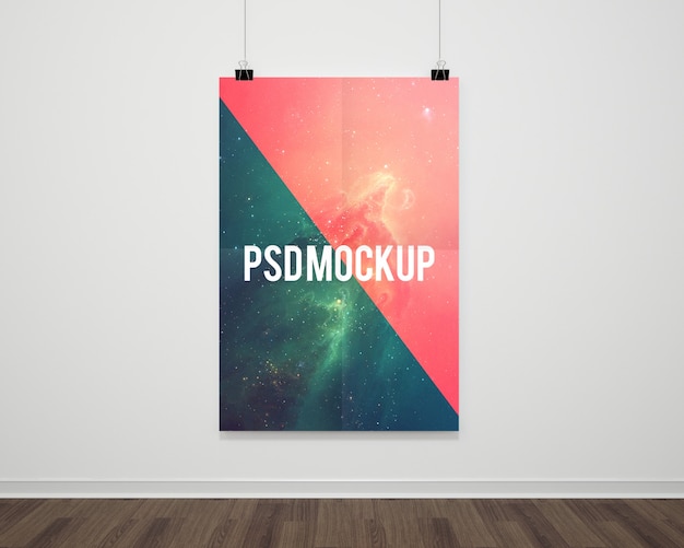 Free PSD poster on white wall mock up