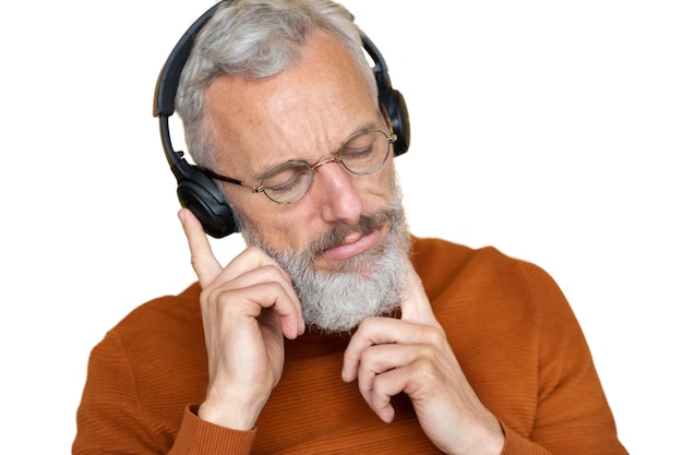 Free PSD senior man listening to music