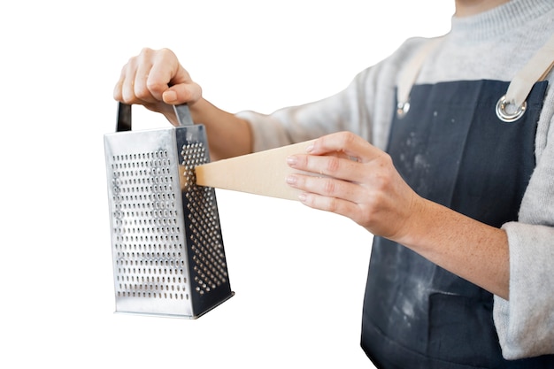 Free PSD side view cook grating cheese