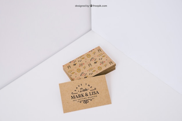 Free PSD stack of cardboard business cards in corner