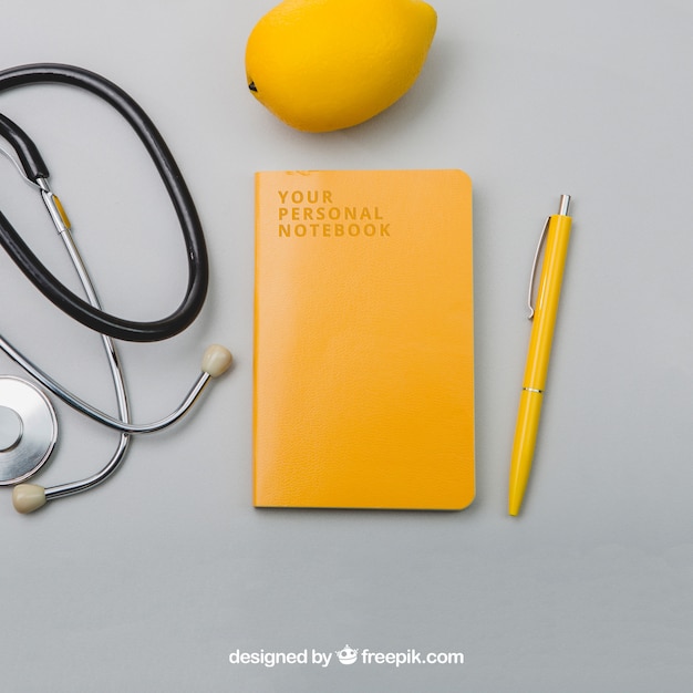 Free PSD stethoscope, lemmon, notebook and pen