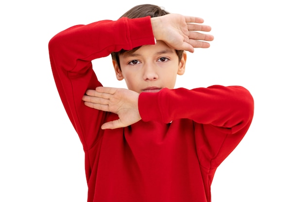 Free PSD studio portrait of young boy with red sweater