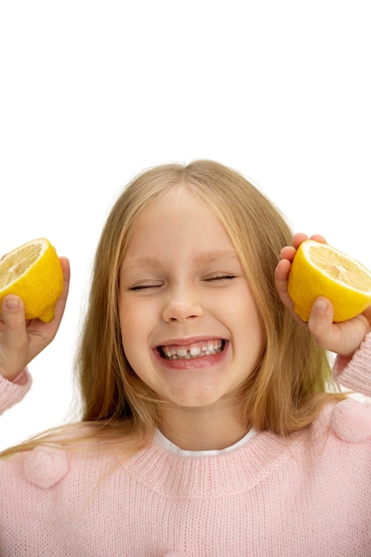 Free PSD studio portrait of young girl with lemon