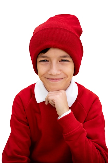 Studio portrait of young girl with red beanie