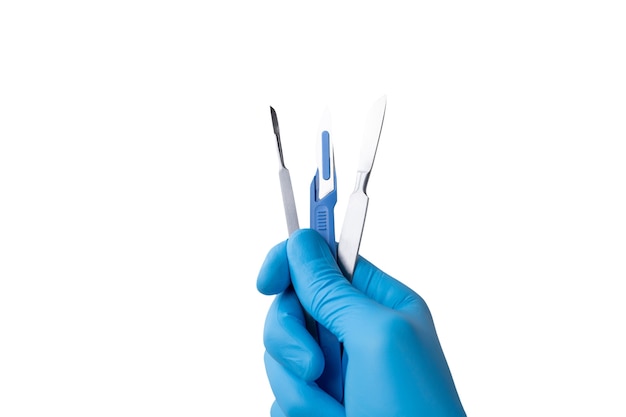 Free PSD surgical scalpel held by hand with glove