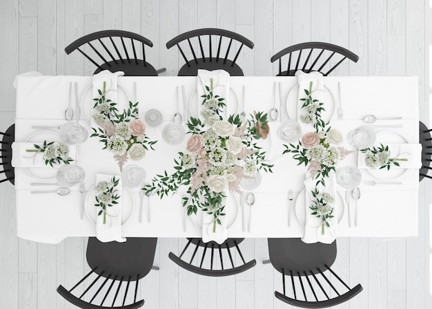 Free PSD table prepared to eat with cutlery and decorative flowers on top view