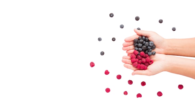 Free PSD view of hands holding fresh berries