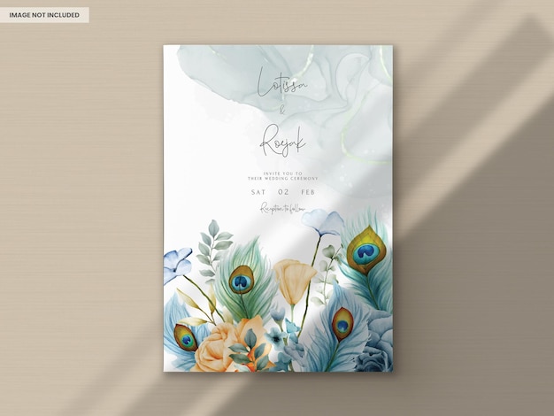 Wedding invitation card with beautiful floral and peacock feather