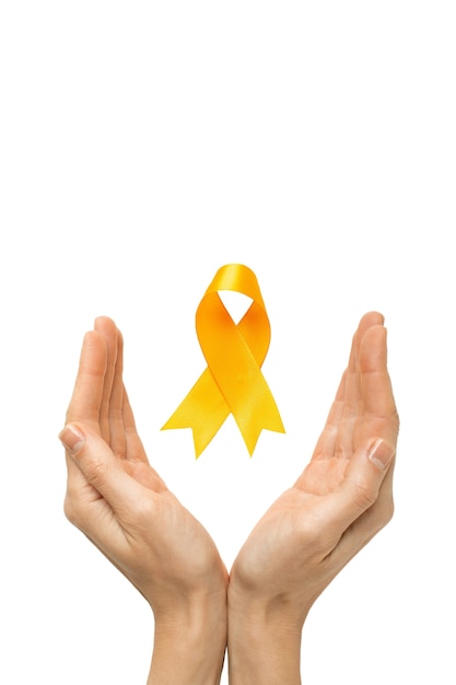 Free PSD yellow ribbon held in hand