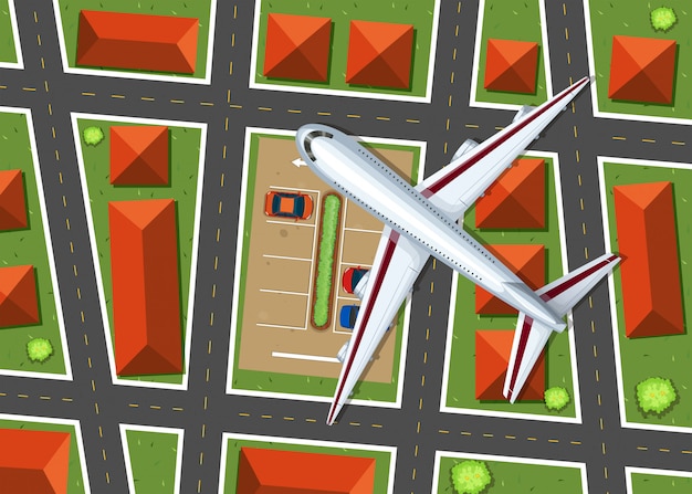 Free Vector aerial view of airplane flying over neighborhood